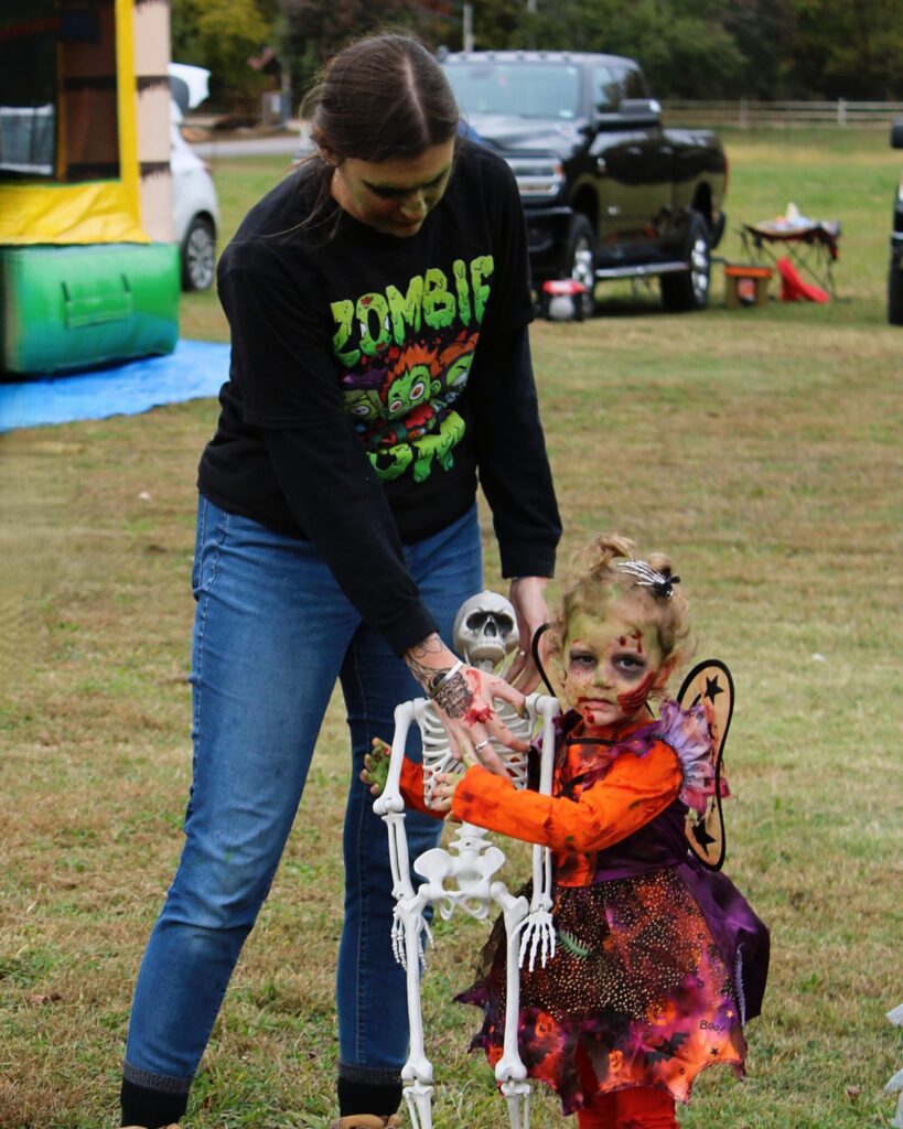 A toddler in a zombie fairy costume